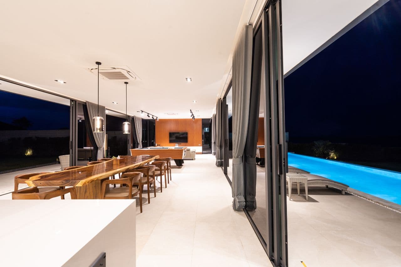 kitchen dining pool night — Astral Villa Hua Hin – Kui Buri